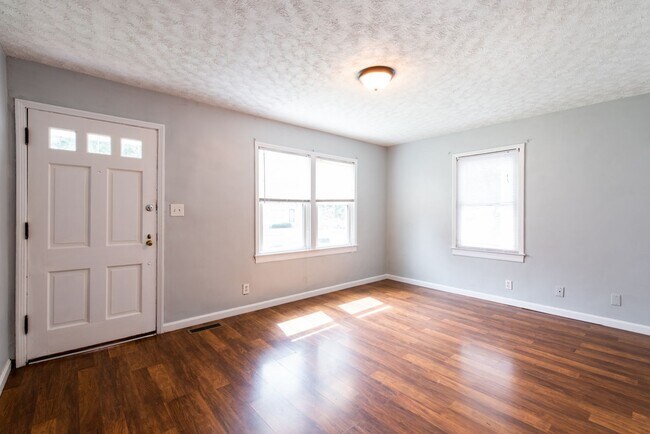 Building Photo - Charming 2-Bedroom Home with Bonus Attic S...