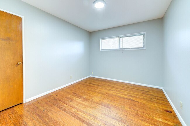 Building Photo - Charming Mid-Century Home with Basement and Fenced Backyard!