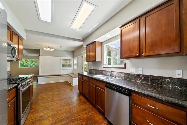 Building Photo - North End corner lot with garden and TONS ...