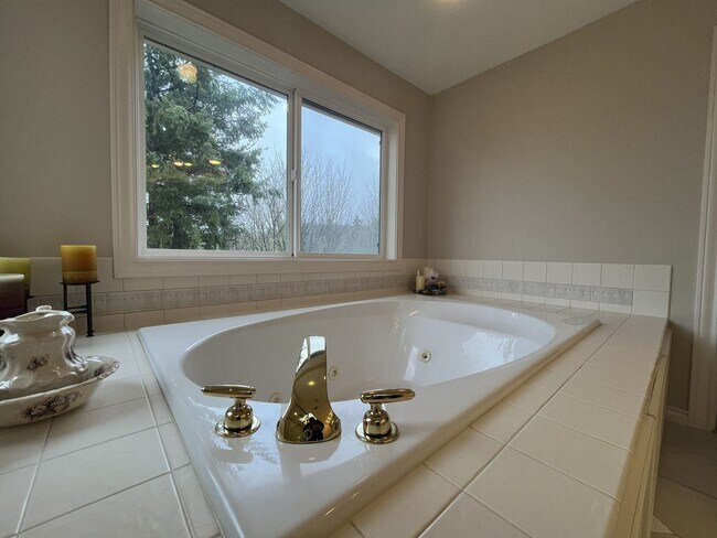 Building Photo - Executive-Style Northwest Heights Home with Forest Views and Refined Architectural Details