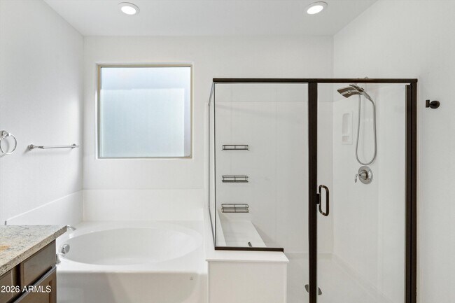 Building Photo - 10812 E Tesla Ave