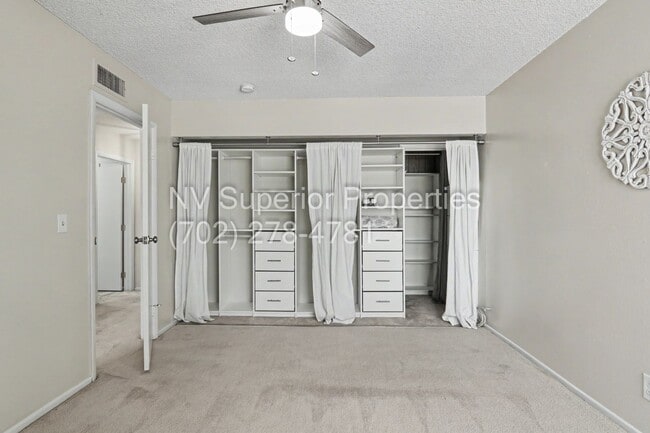Building Photo - SE!! Close to UNLV!! 2 Bedroom 2 story!! 1 Car Carport!! Fully Furnished!! Community Pool!! and T...