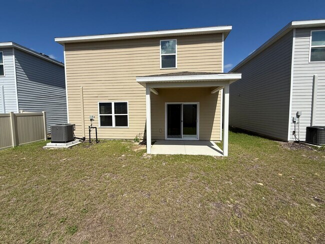 Building Photo - Spacious 4-Bedroom Modern Home in Oaks Preserve – Perfect Gainesville Location