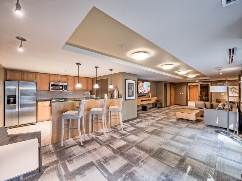 Host, cook, and relax in the communal owner's lounge featuring a full chef's kitchen - 2929 1st Ave