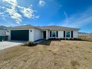 Building Photo - 4 Bedroom -2 Bathrooms NE Cape Coral- City Water (Del Prado & Pine Island)