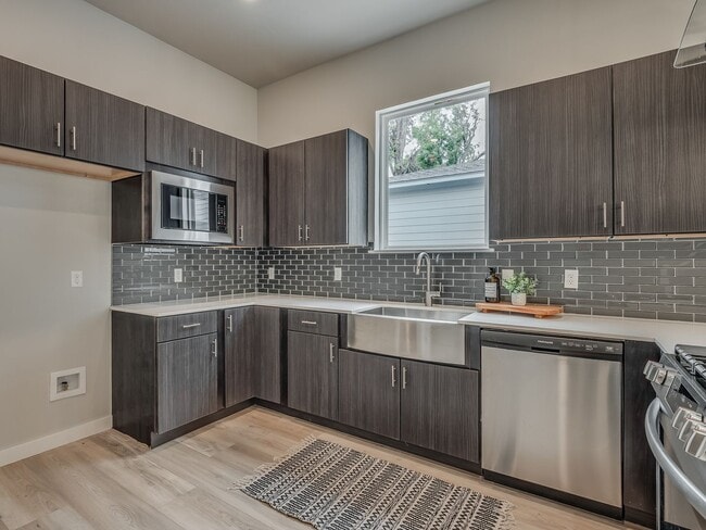 Building Photo - Spacious 4-Bedroom Home with Thoughtful De...