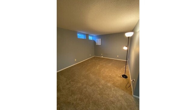 Building Photo - Spacious 3 - Bedroom Townhome with Modern Updates & Private Green Space.