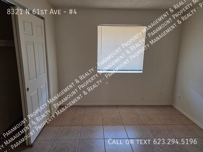 Building Photo - 8321 N 61st Ave
