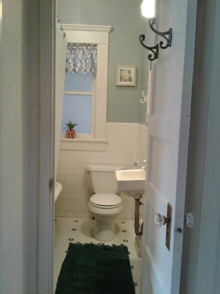 Cute bathroom includes a clawfoot tub. - 1509 West Hazel Street