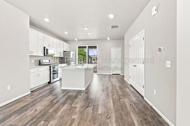 Building Photo - 12231 W 57th Dr