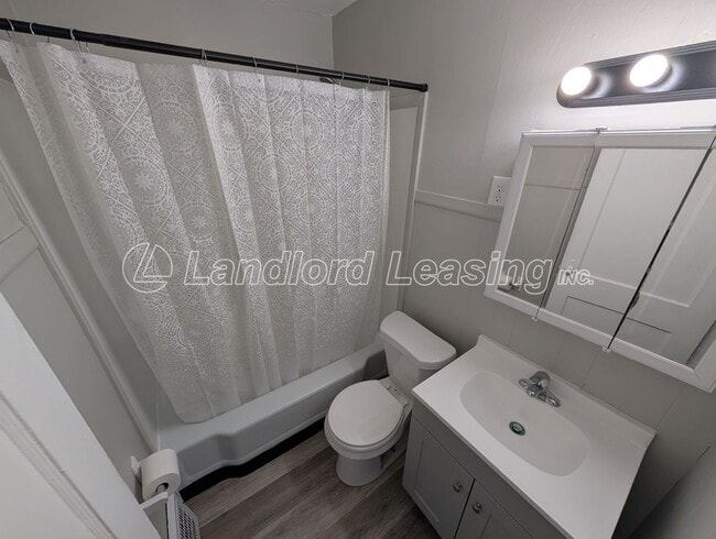 Building Photo - Well-Maintained Cape Cod with Garage on Corner Lot