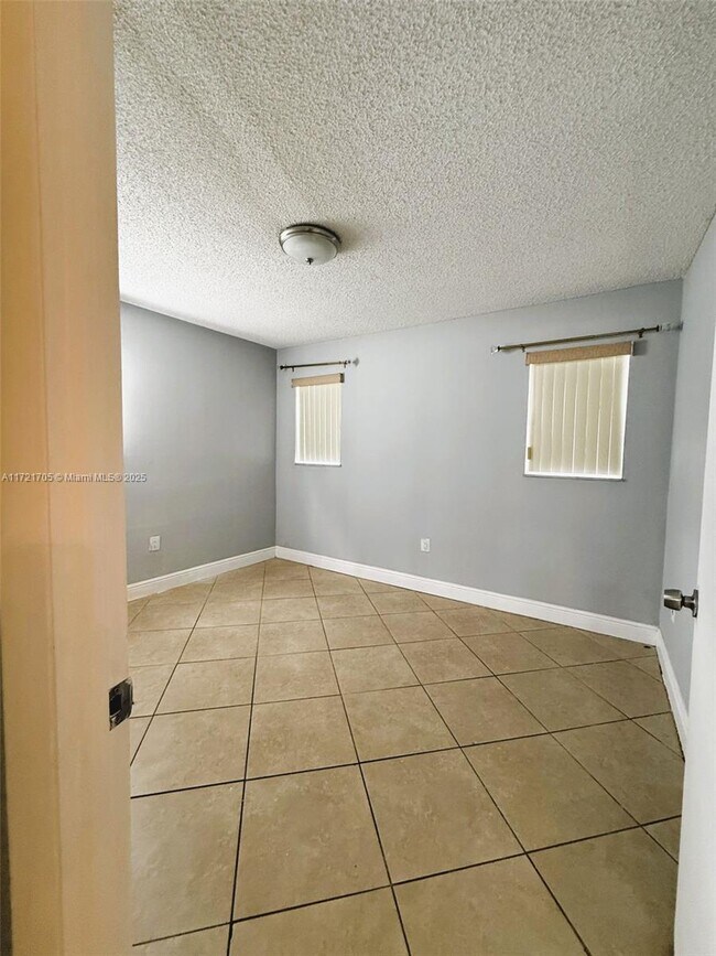 Building Photo - 8300 Sunrise Lakes Blvd