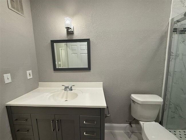 Building Photo - 9258 Lake Chase Island Way