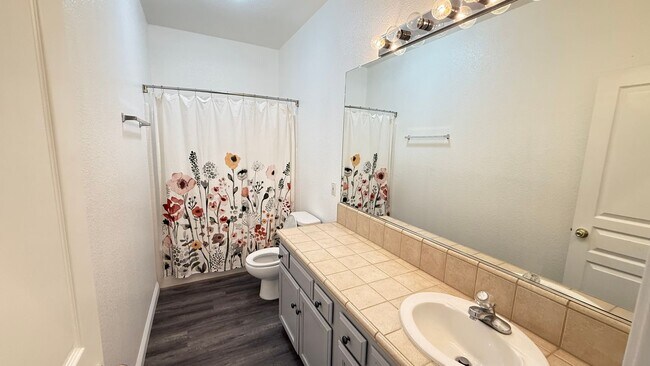 Building Photo - 3 Bedroom, 2 Bathroom Home with Pool locat...