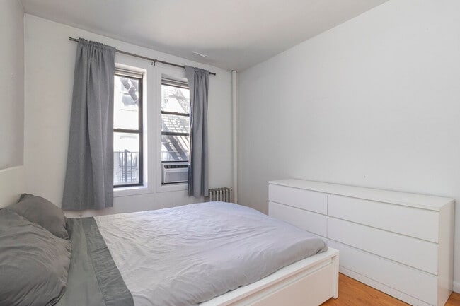 Building Photo - 315-317-317 E 95th St