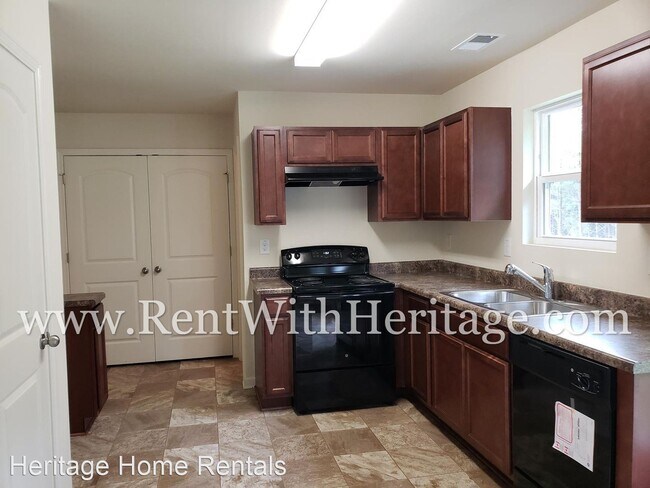 Building Photo - 3 br, 2.5 bath House - 4033 Sitka Drive