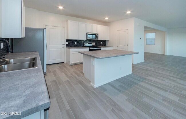 Building Photo - 7243 N 125th Dr