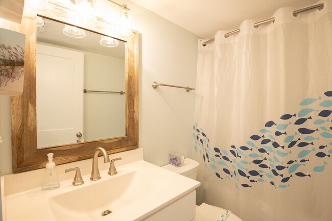 Building Photo - SPEND YOUR OFF-SEASON AT THIS TOP FLOOR OCEANFRONT CONDO