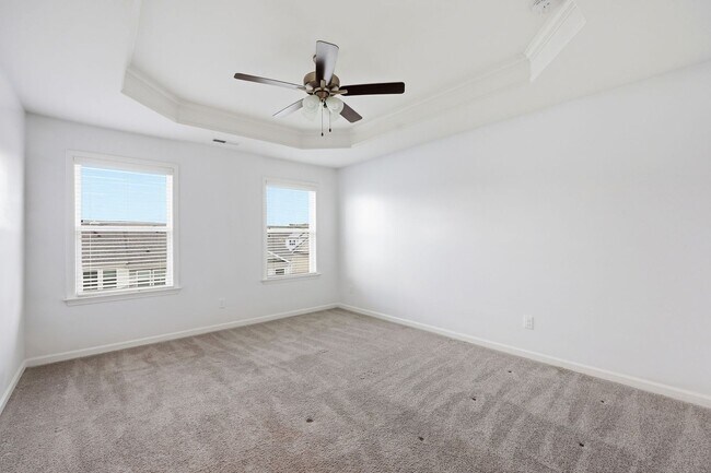 Building Photo - Modern 4BR Townhome with Washer/Dryer & Pet-Friendly Living in Morrisville!