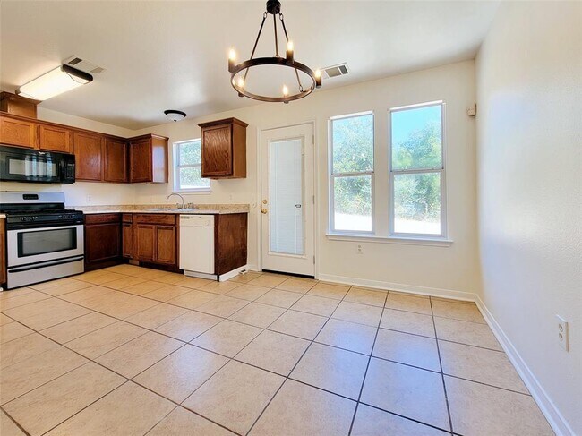 Building Photo - 7400 Muffin Dr