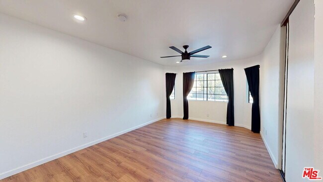 Building Photo - 10220 De Soto Ave