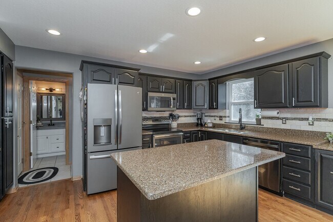 Building Photo - Spacious Home With Finished Basement And 3 Car Garage