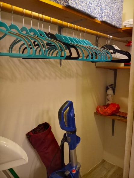 Full size storage closet with hangers - 23 Rexford St