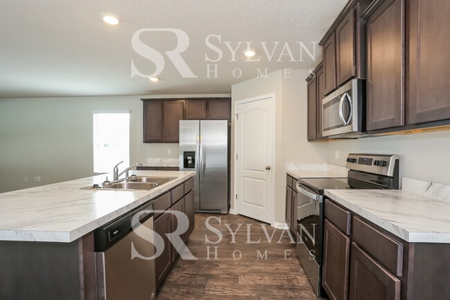 Building Photo - Turn the key. Enter. Smile. Repeat every day!