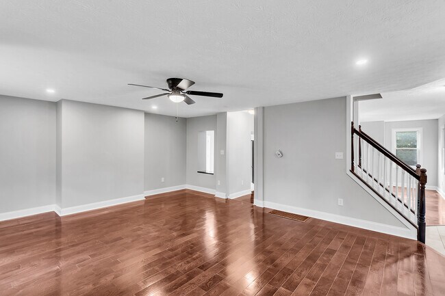 Continuation of living room. The entire home has been re-wired with brand new electrical. - 2416 Magee Road Ext