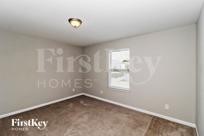 Building Photo - 5695 Saint Adriens Way