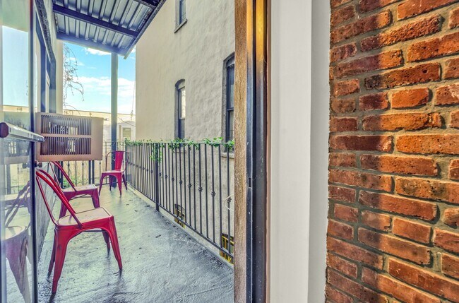 Building Photo - Welcoming  1-Bedroom with Home Office and Private Terrace.