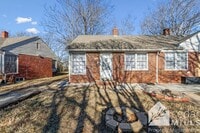 Building Photo - Updated, clean unit, with LARGE basement for storage!