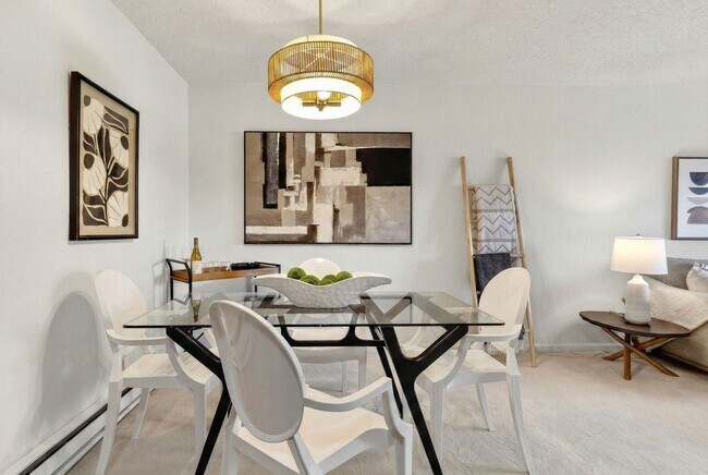 Building Photo - Modern 2-Bedroom Condo with Pool and Koi Pond Views