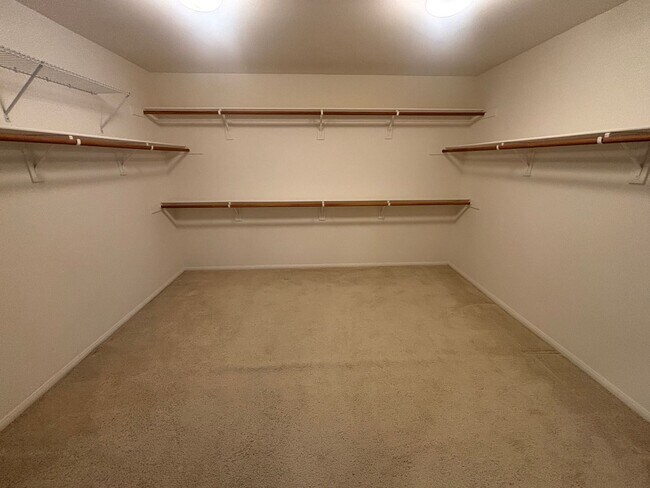 Building Photo - Spacious 4-Bedroom Home with Community Ame...
