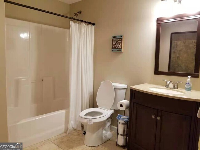 Building Photo - 6729 Great Water Dr