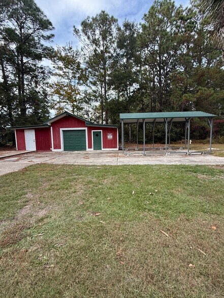 Covered parking for one vehicle . Storage garage. - 235 Waterside Ln