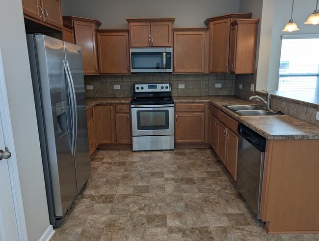 Building Photo - Pristine, move in ready Home located in th...