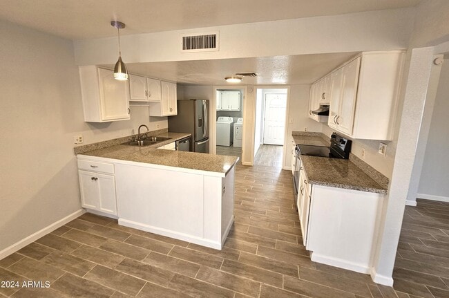 Building Photo - 8220 W Monaco Blvd