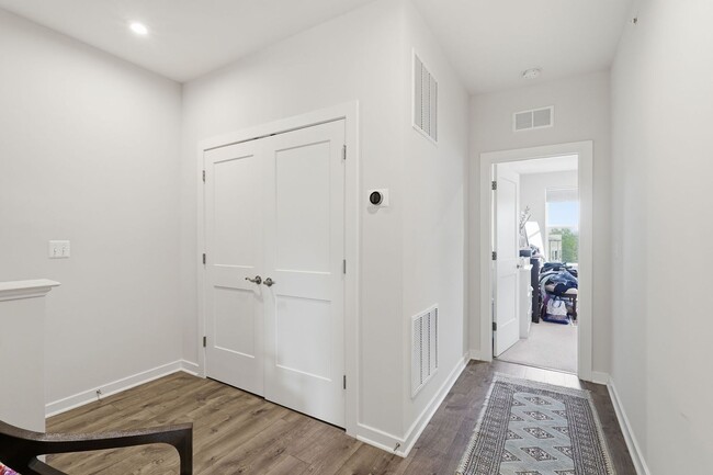 Building Photo - Perfectly positioned near the vibrant shopping and dining destination of One Loudoun, this reside...