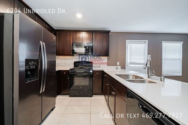 Building Photo - 6204 Unbridled Dr