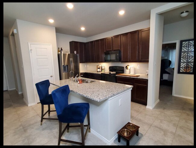 Building Photo - Modern 3-Bed Home with Island Kitchen, Private Patio, and Fenced Yard in Converse