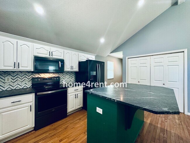 Building Photo - Overland Park Raised Ranch, Primary Suite ...
