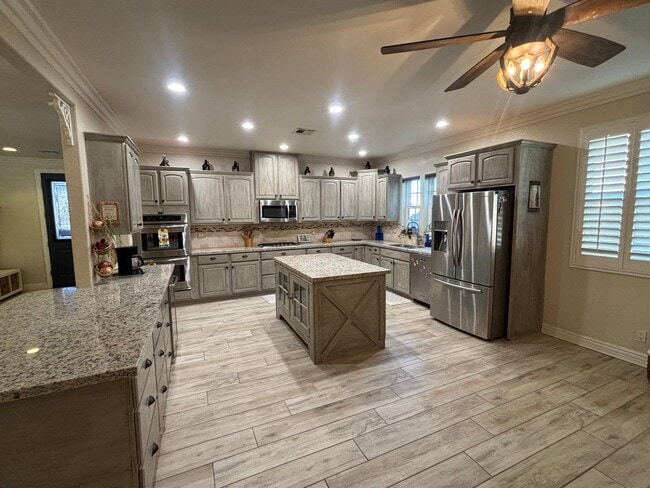 Building Photo - 4-Bedroom Single-Story Home with Solar & RV Parking