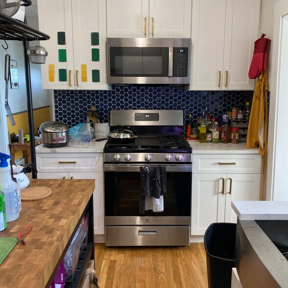 Kitchen with stove, microwave, and dishwasher - 71 Wellington Ave