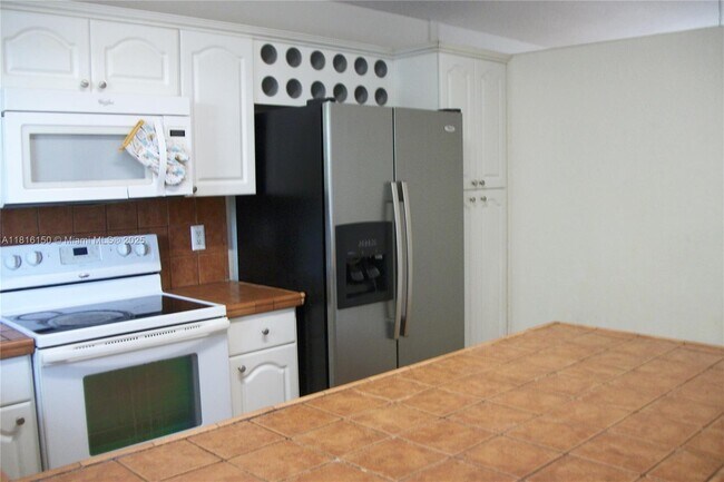 Building Photo - 7230 W 34th Ct