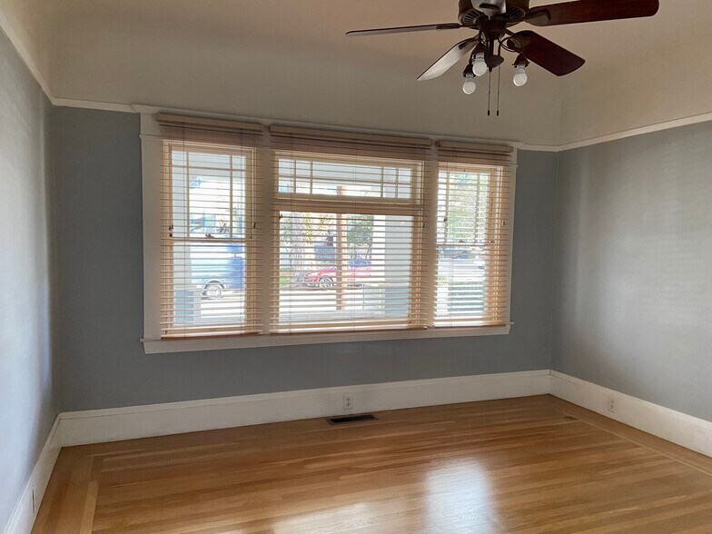 1st bedroom or office (incl. small built-in closet) with a view out to the main entrance porch - 1608 22nd St
