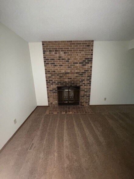 Downstairs fireplace - 3700 Westmark Cir