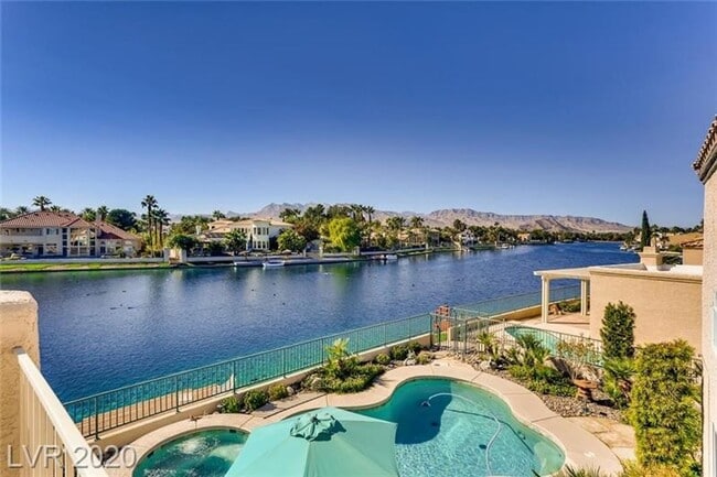 Building Photo - Vegas's Only Available Waterfront Rental ~ 4 Bedroom Desert Shores Lake Front Home