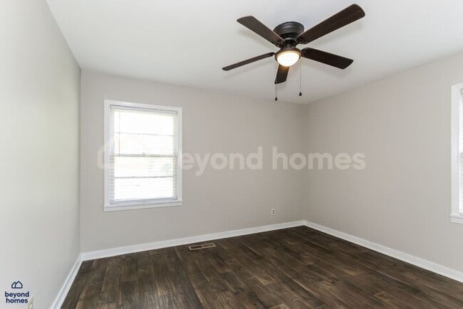 Building Photo - Updated Bungalow with Massive Deck and Fully Fenced Yard!