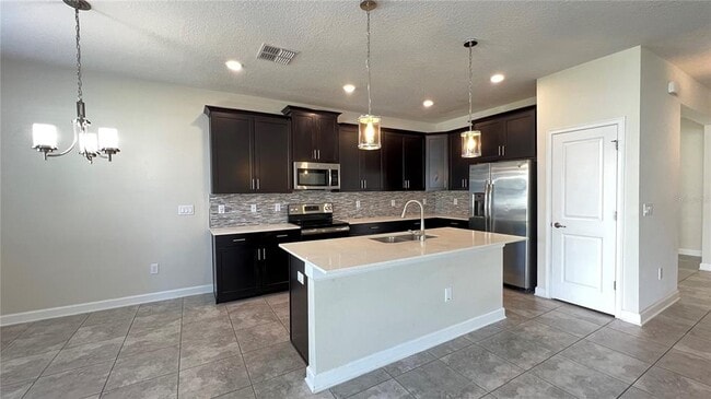 Building Photo - 15079 Evergreen Oak Loop